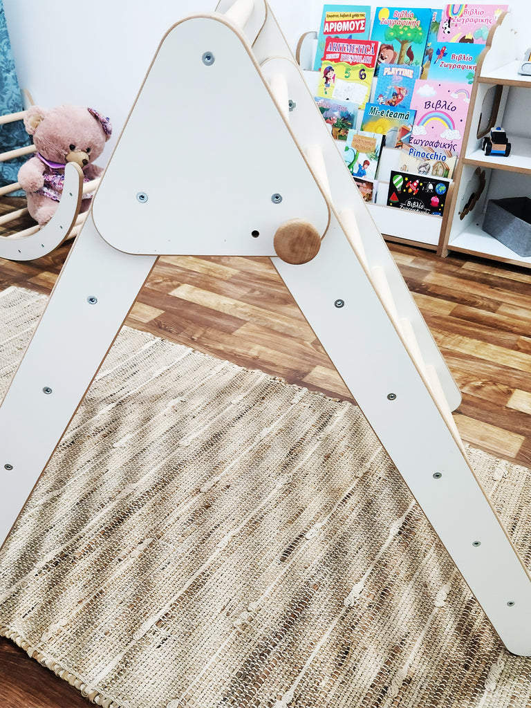A foldable climbing triangle is a versatile and compact play structure designed to help children develop their gross motor skills, balance, and coordination. As the name suggests, this climbing triangle can be easily folded and stored away when not in use, making it a great space-saving solution for families.